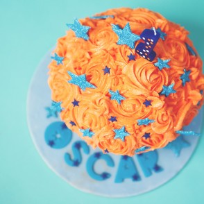 Giant Cupcake with orange and turqoise icing - Cake Smash Photography Dartford Kent