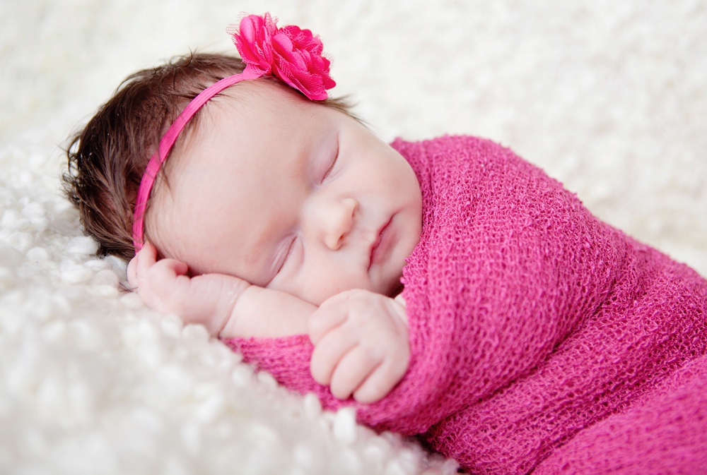 Newborn Photographer Orpington - Baby Swaddled in Pink Wrap