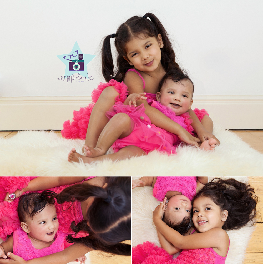 6 month old baby poses with her sister Baby Photography Bromley