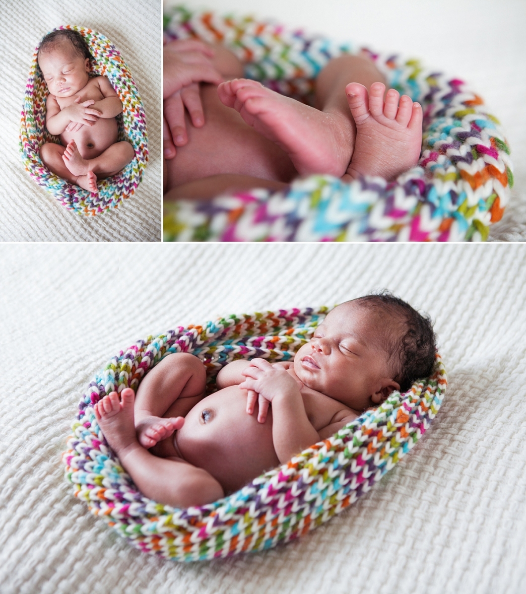baby girl in multi coloured wrap