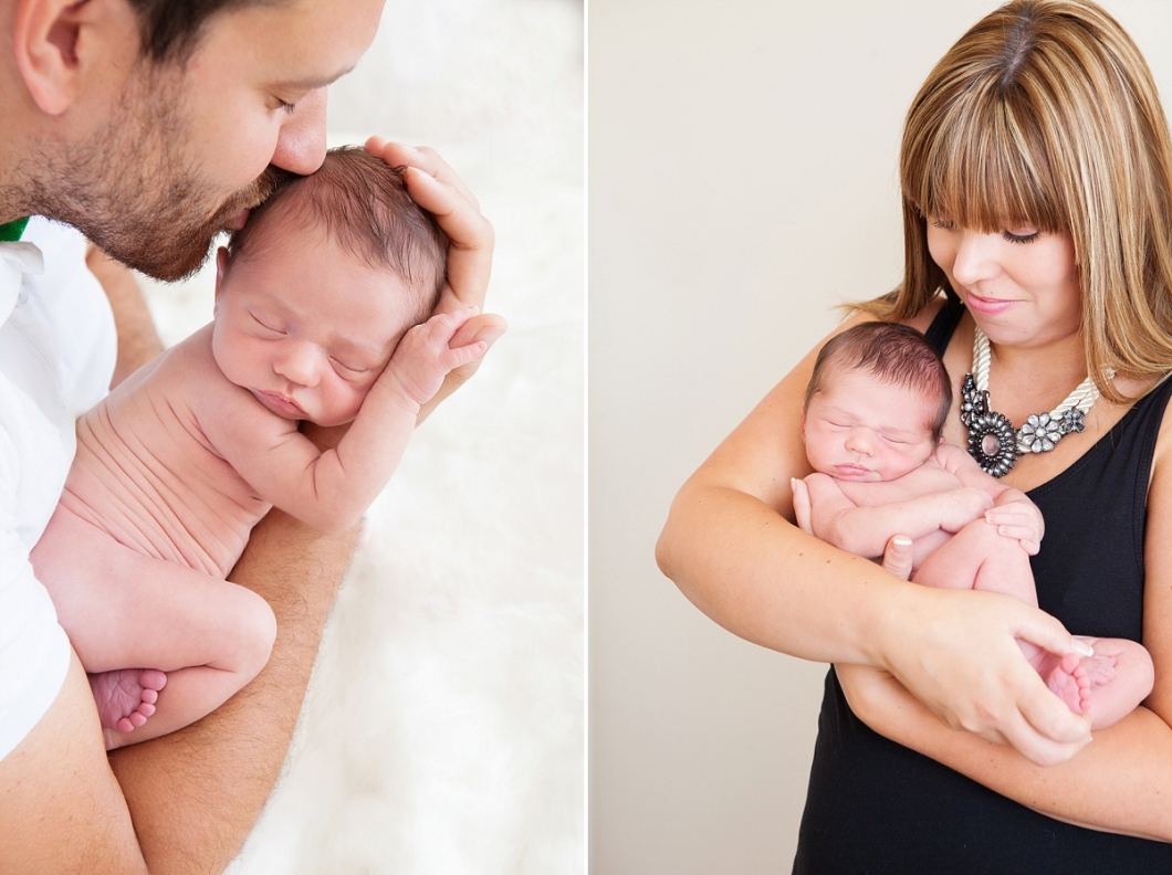 Parents cradle their new baby boy - Newborn Baby Photography Welling Kent