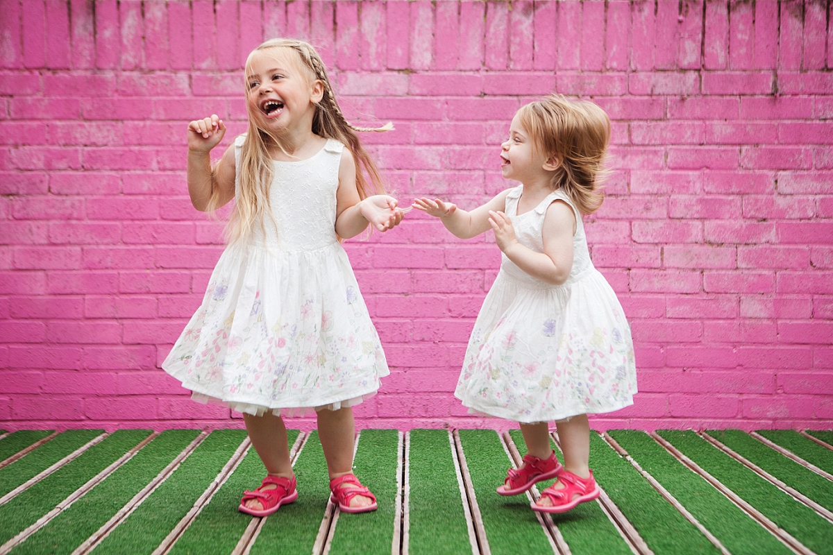 family portraits - girls on pink and green background croydon